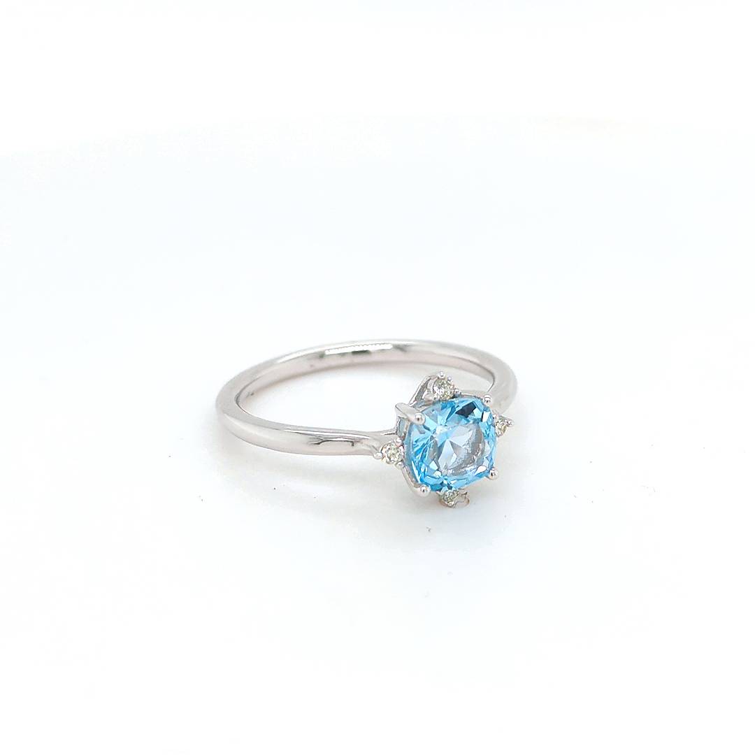 BLUE TOPAZ AND DIAMOND RING