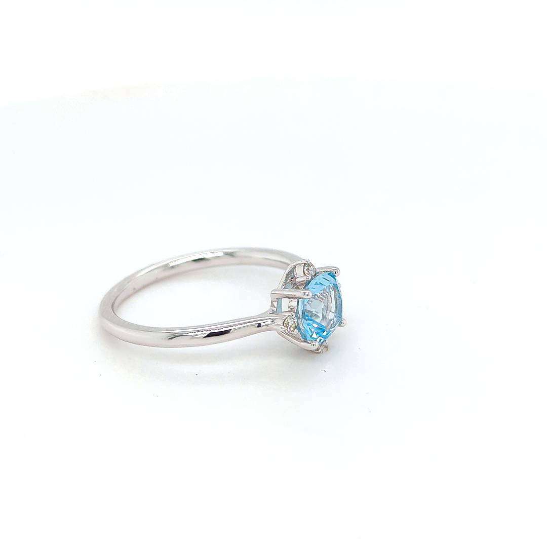 BLUE TOPAZ AND DIAMOND RING