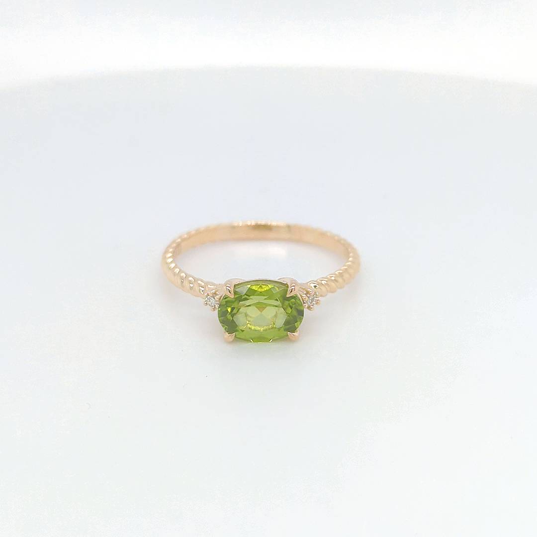 OVAL PERIDOT & DIAMOND RING