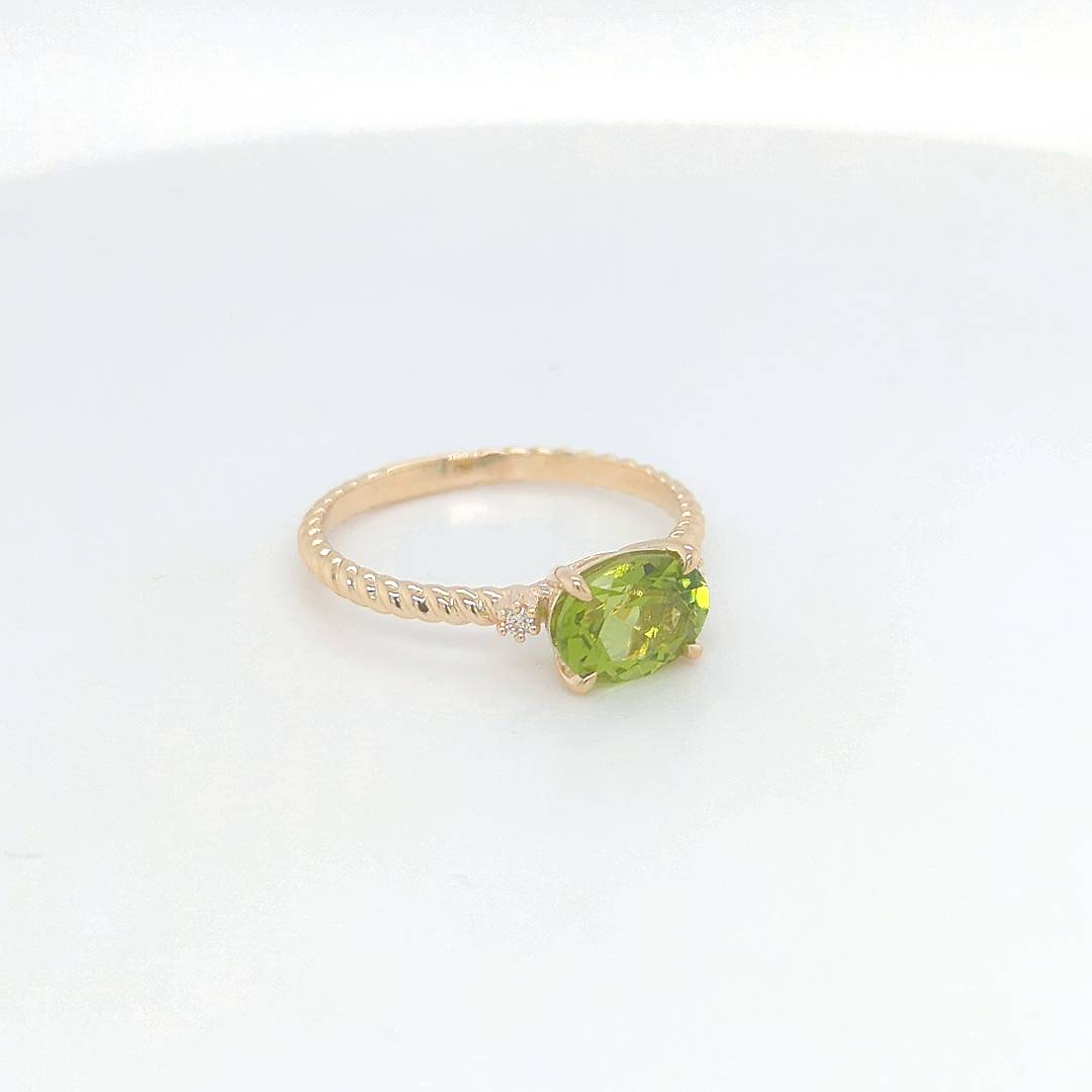 OVAL PERIDOT & DIAMOND RING