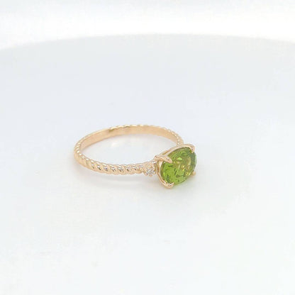 OVAL PERIDOT & DIAMOND RING