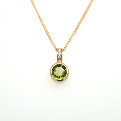 PERIDOT AND DIAMOND PENDANT