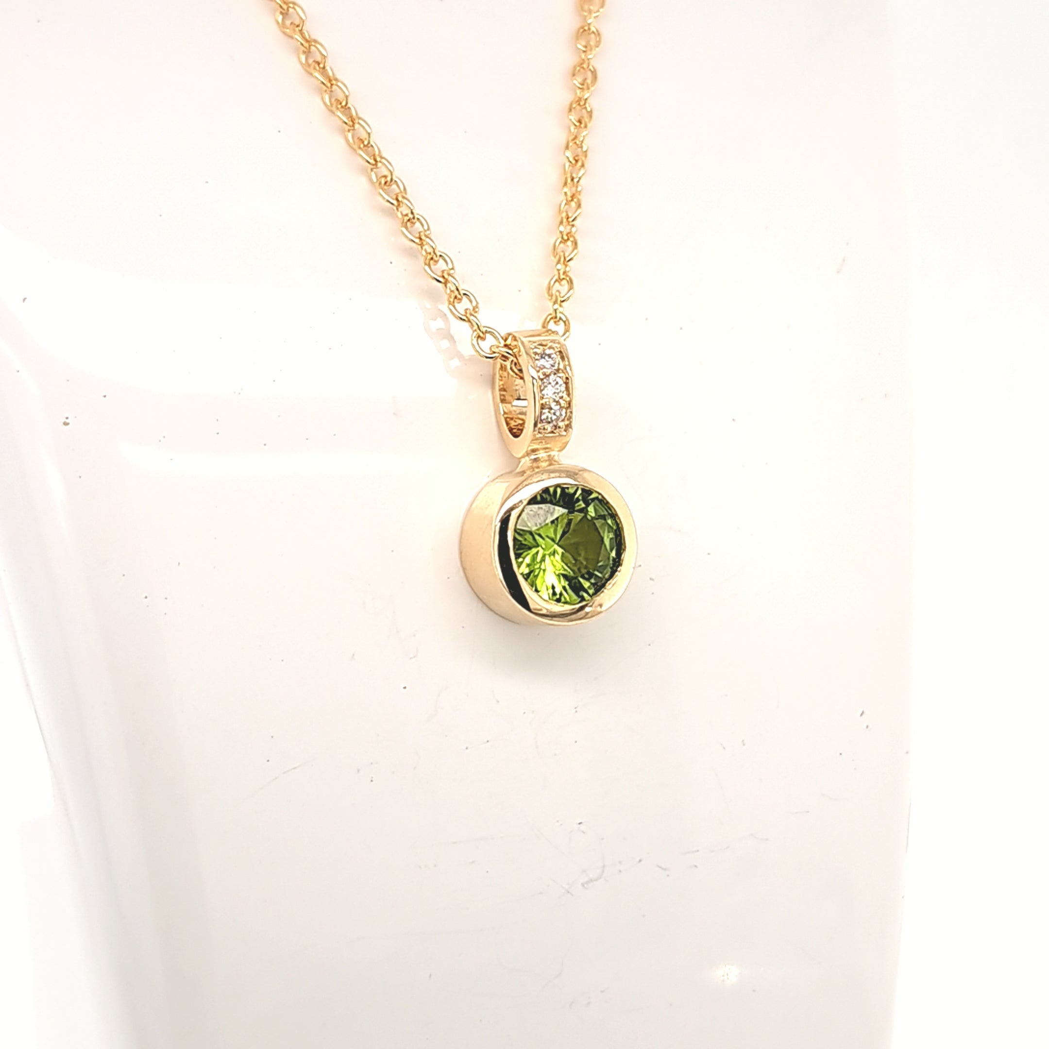 PERIDOT AND DIAMOND PENDANT