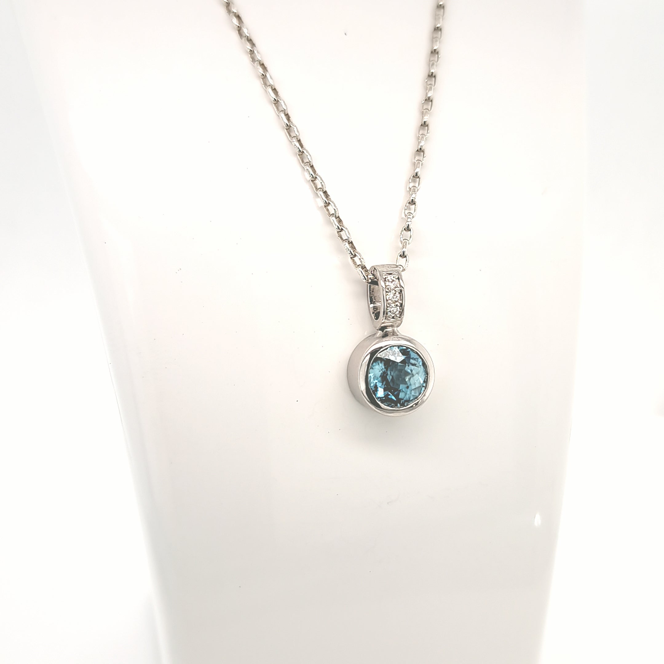 BLUE ZIRCON & DIAMOND PENDANT