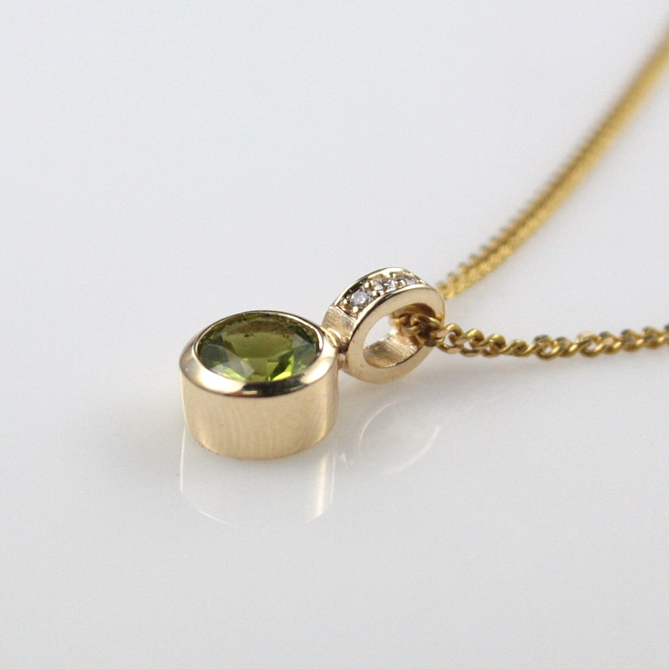 PERIDOT AND DIAMOND PENDANT