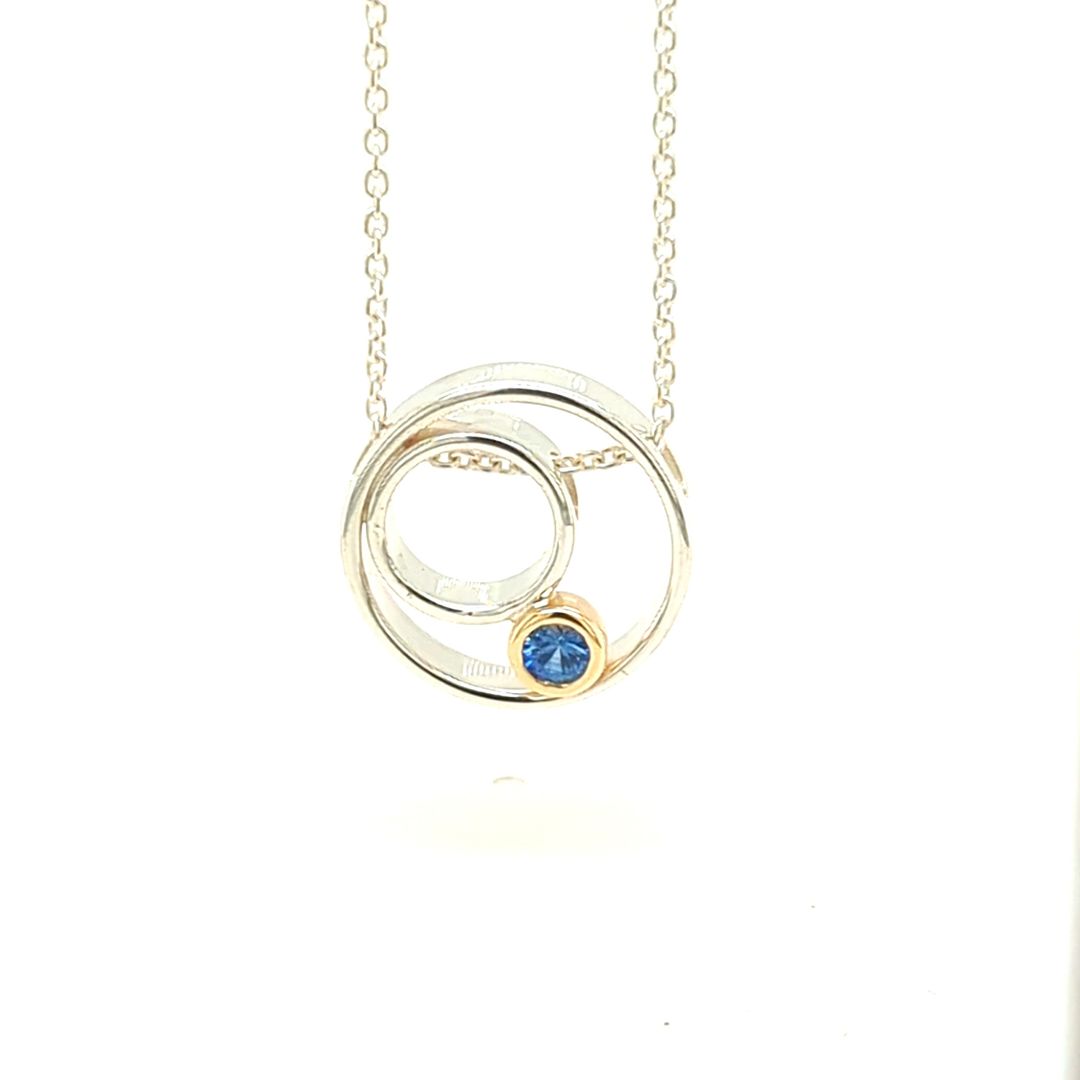 CIRCULAR SAPPHIRE PENDANT