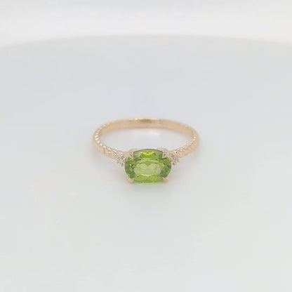 OVAL PERIDOT & DIAMOND RING