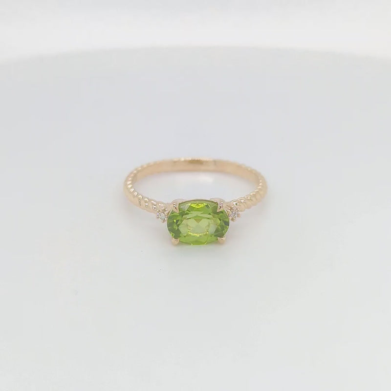 OVAL PERIDOT & DIAMOND RING