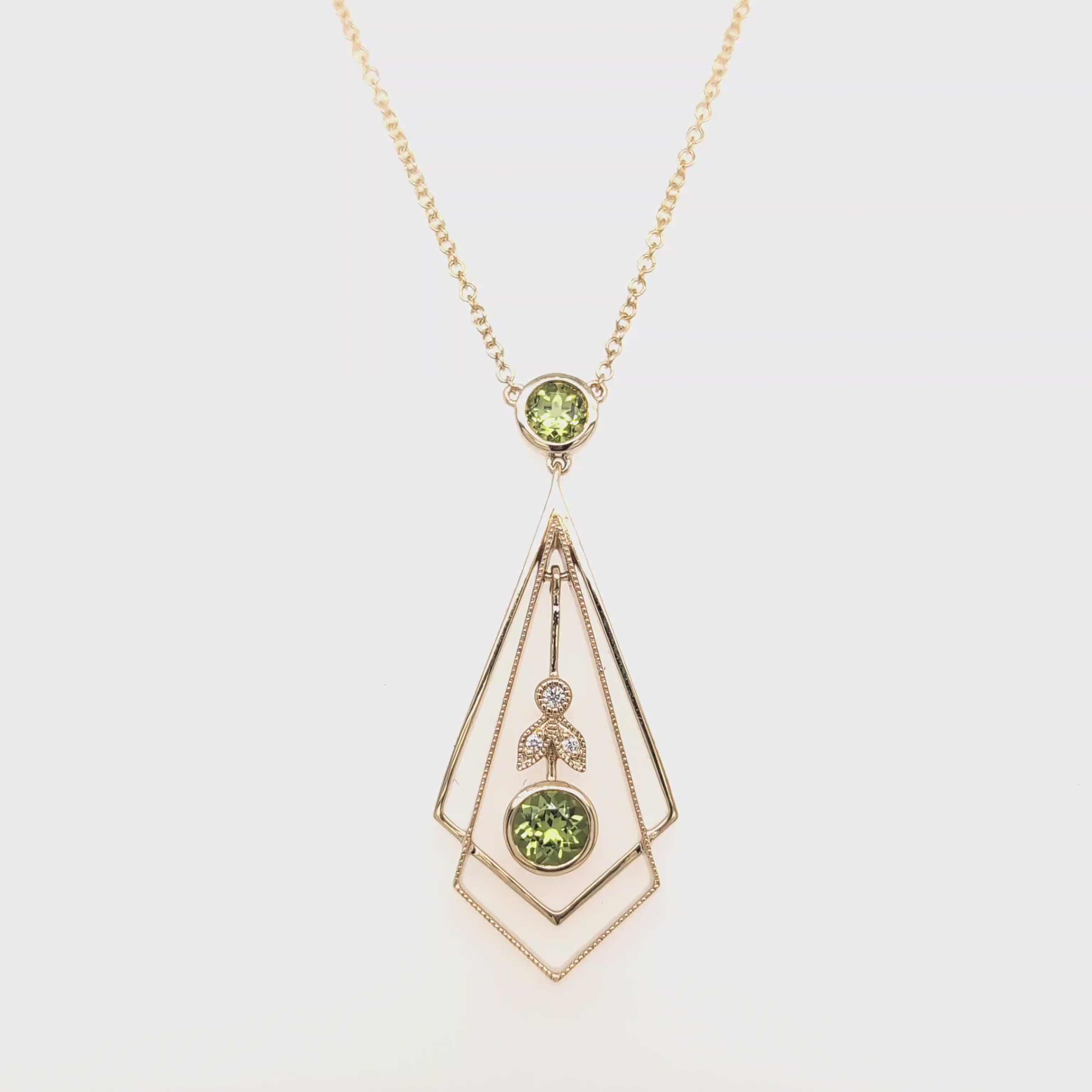 Load video: PERIDOT AND DIAMOND PENDANT INCL CHAIN